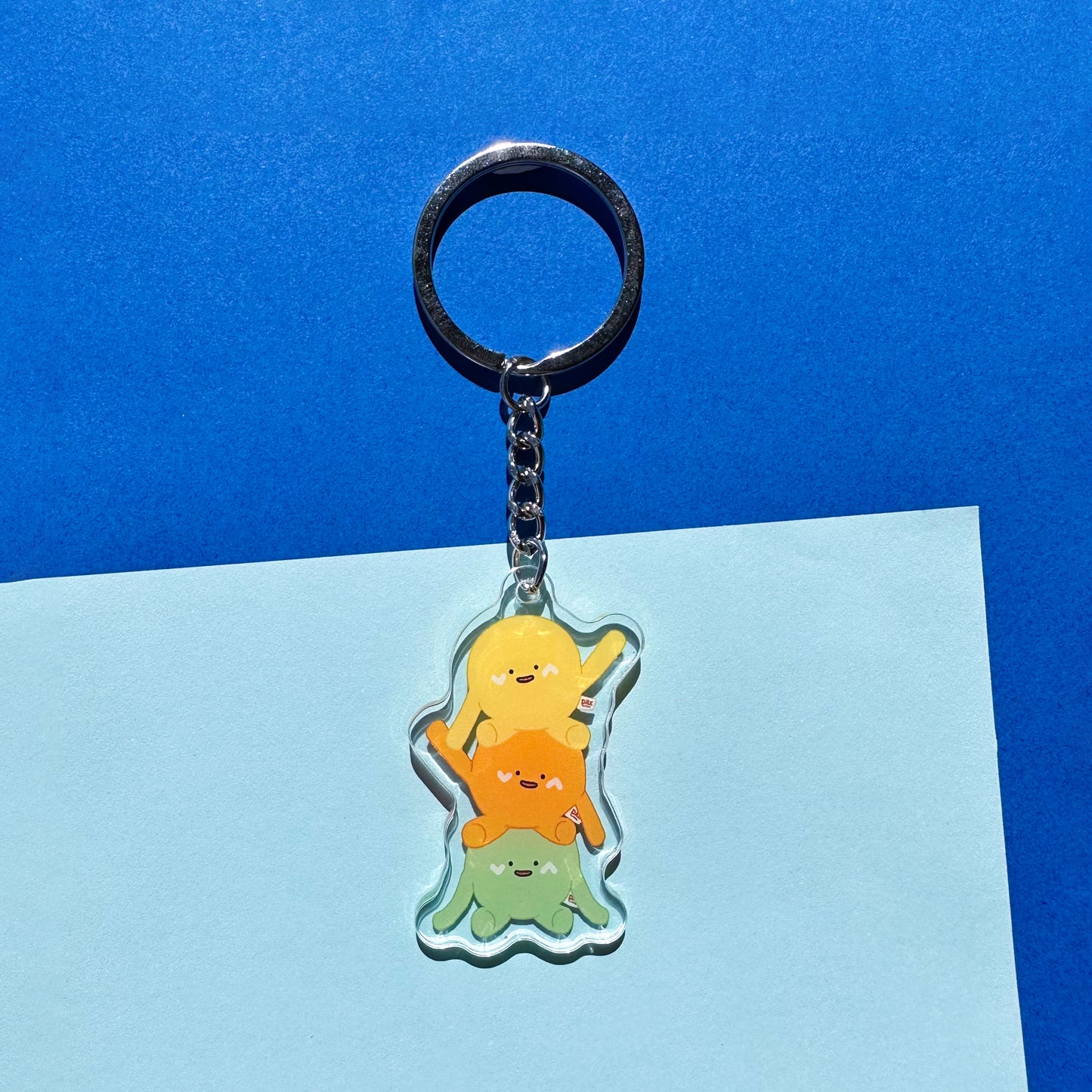 "Three Dots Waving" Keyring